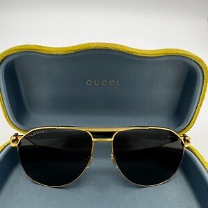 Gucci Gold Frame Sunglasses with Black Lenses